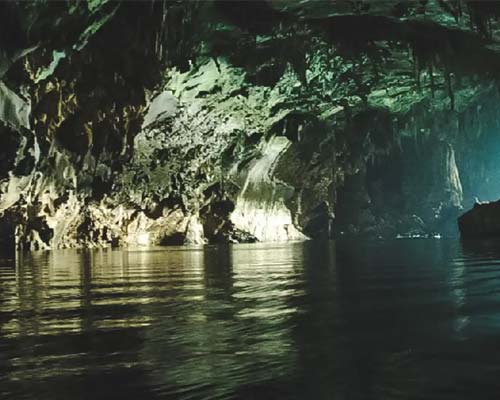 Inside Konglor Cave with boat