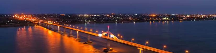 Savannakhet cityscape with colonial buildings and Mekong River