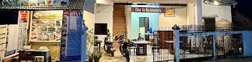 Lively common area at Easy Go Hostel Vang Vieng